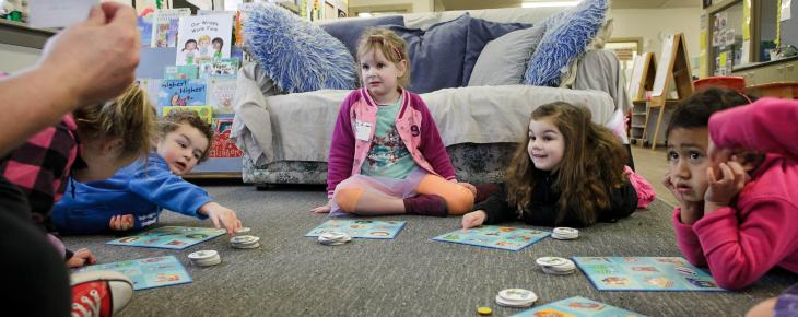 Children playing educational board games at our Christchurch preschool